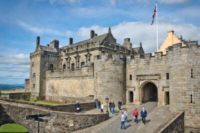 Day Trip to Loch Lomond and Trossachs National Park with Optional Stirling Castle Tour from Edinburgh - Balmaha on Loch Lomond: the loch walk, Ben Lomond views, and real-world footwear
