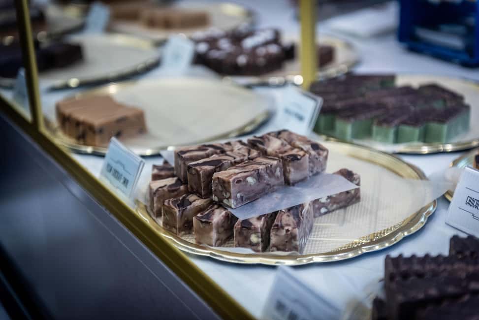 Edinburgh: Historical Gems Tour & A Taste of Scottish Fudge - Canongate District: where the tour slows down and the city gets quieter