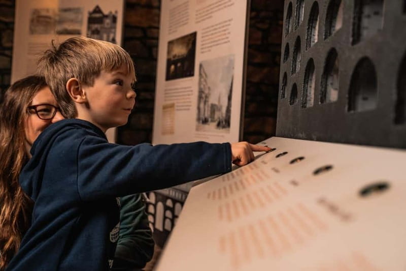 Edinburgh: Kids Immersive Underground Small-Group Tour - Walking in: starting at Mercat Cross with kids who need structure
