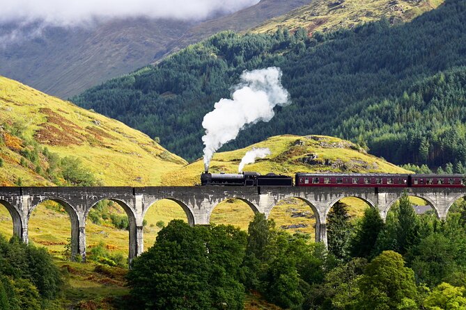 Glenfinnan Viaduct Glencoe and Fort William Tour from Edinburgh - Commando Monument: Ben Nevis in the Background