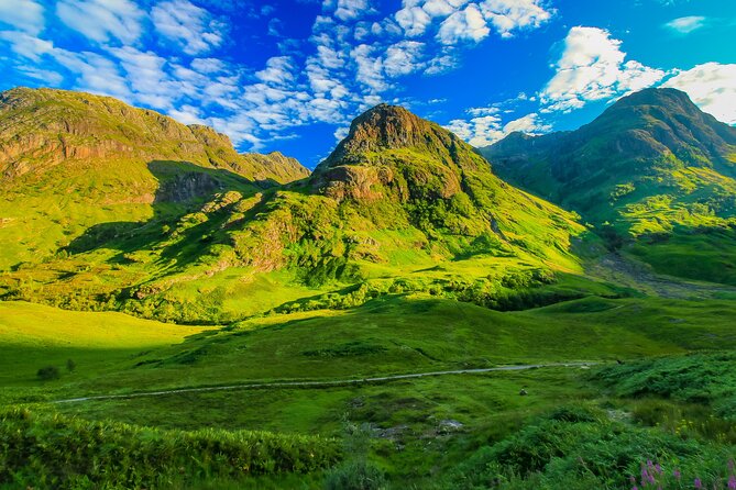 Highlands Cows Glencoe and Castles Private Tour from Edinburgh - Loch Lomond and Luss: Classic Photos With Real Convenience